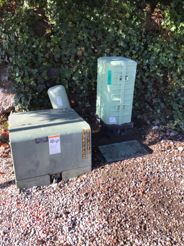 Pedestal device next to pad-mounted transformer