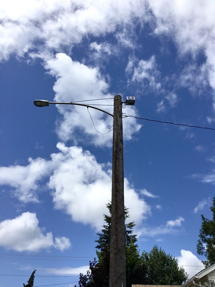 Pole device in area with overhead service