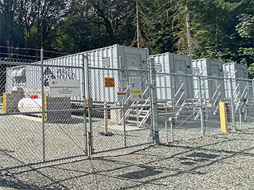 Glacier BESS consists of lithium‑ion batteries stored in four shipping containers
