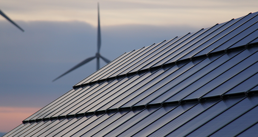 roof with wind turbine in background