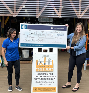 Poster size check presented to South King Tool Library