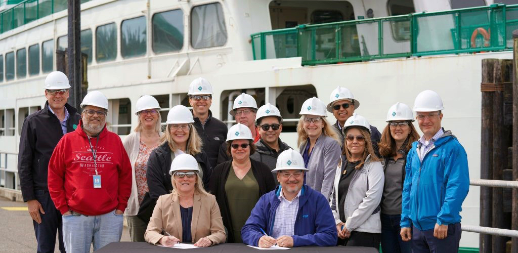 PSE and WSF staff signing our partnership agreement in May 2023