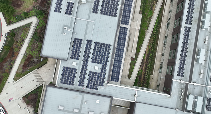 Aerial view of Pine Lake Community Solar generation site rooftop panels