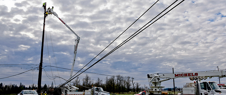 Repair crew working on downed power lines