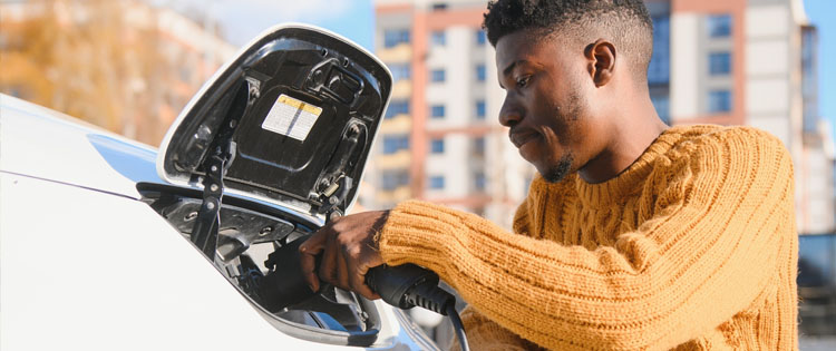 Multifamily webpage hero photo option man charging car