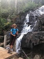 Molly by a waterfall